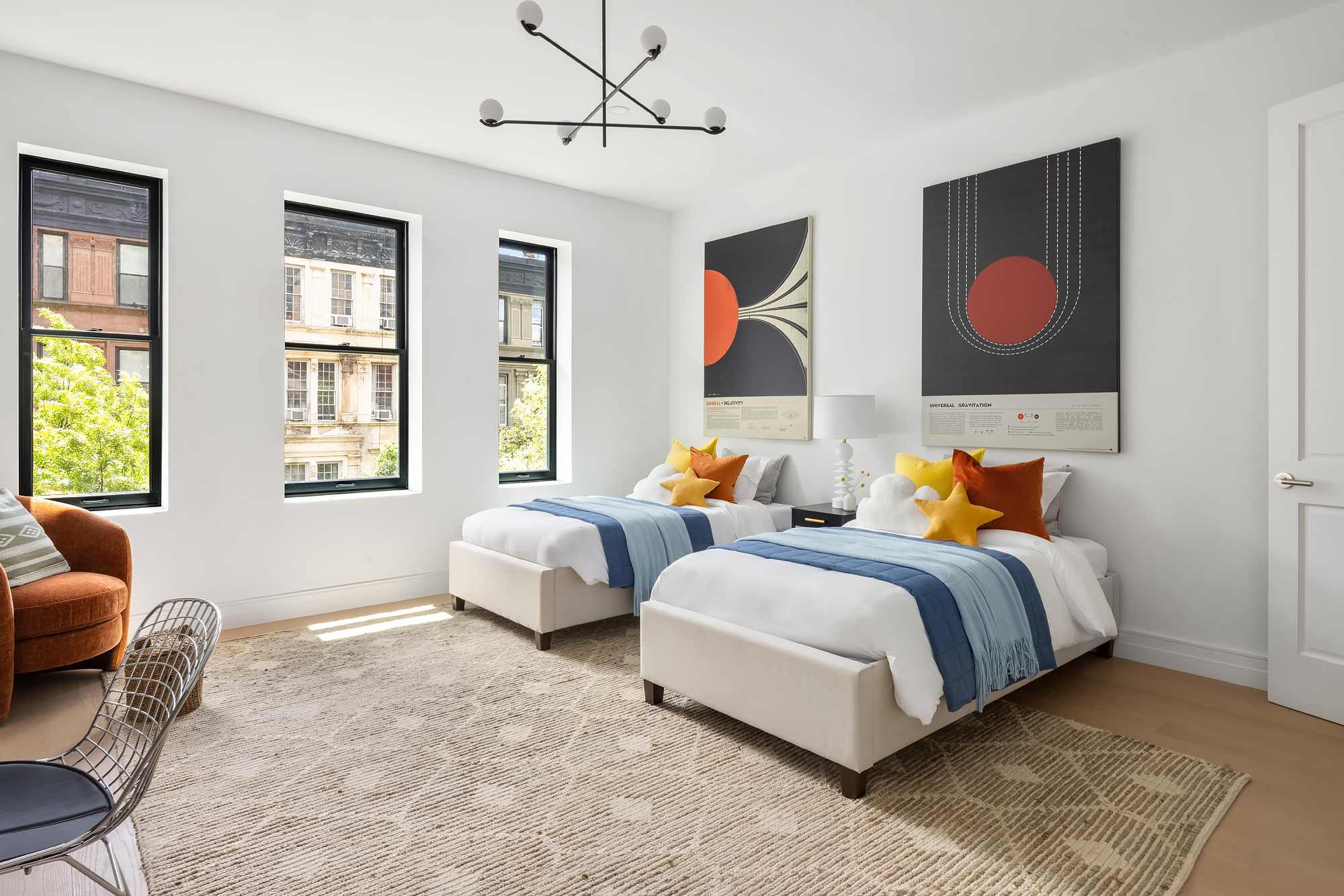 53 West 85th Street Manhattan, NY 10024 - Photo 25 of 37 a bedroom with bed couch and window