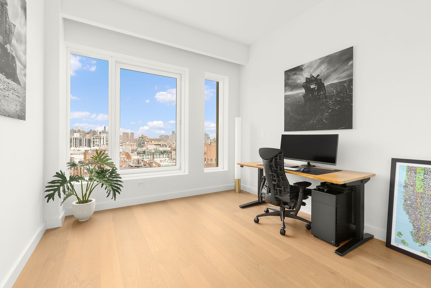 a workspace with furniture and a window