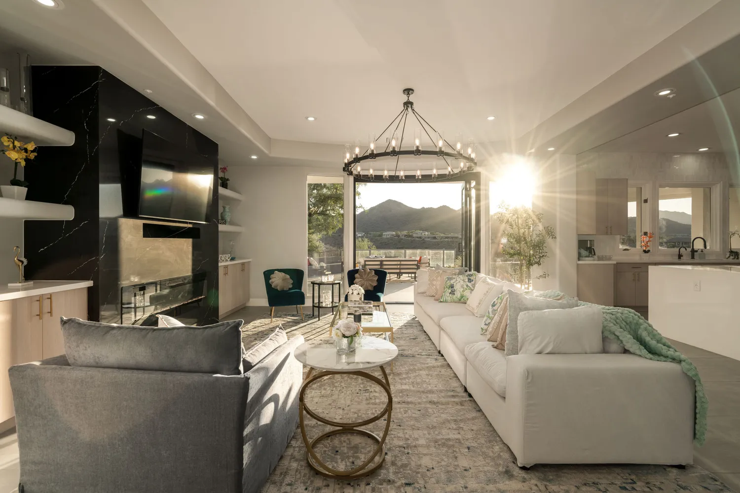 a living room with furniture a fireplace and a flat screen tv