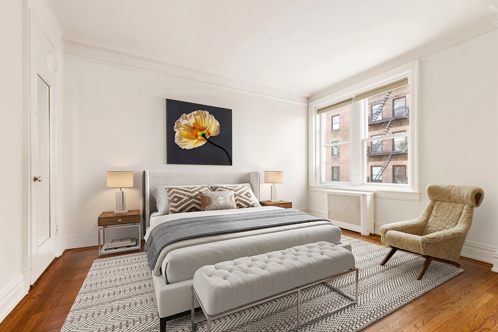 360 Riverside Drive, Unit 8A Manhattan, NY 10025 - Photo 7 of 20 a bedroom with a bed and wooden floor