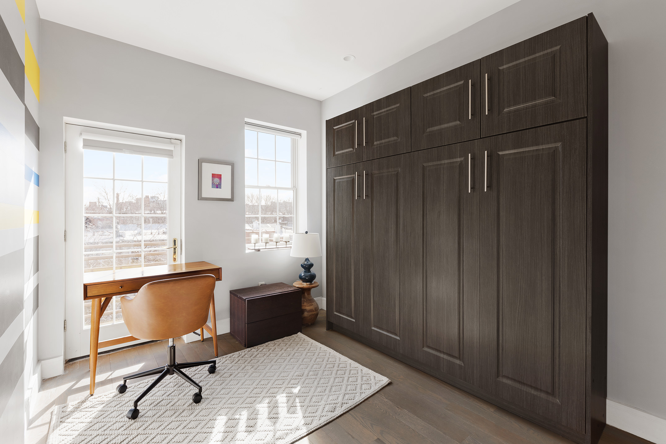 476 Hancock Street, Unit 3 Brooklyn, NY 11233 - Photo 8 of 9 a view of a livingroom with furniture and a window