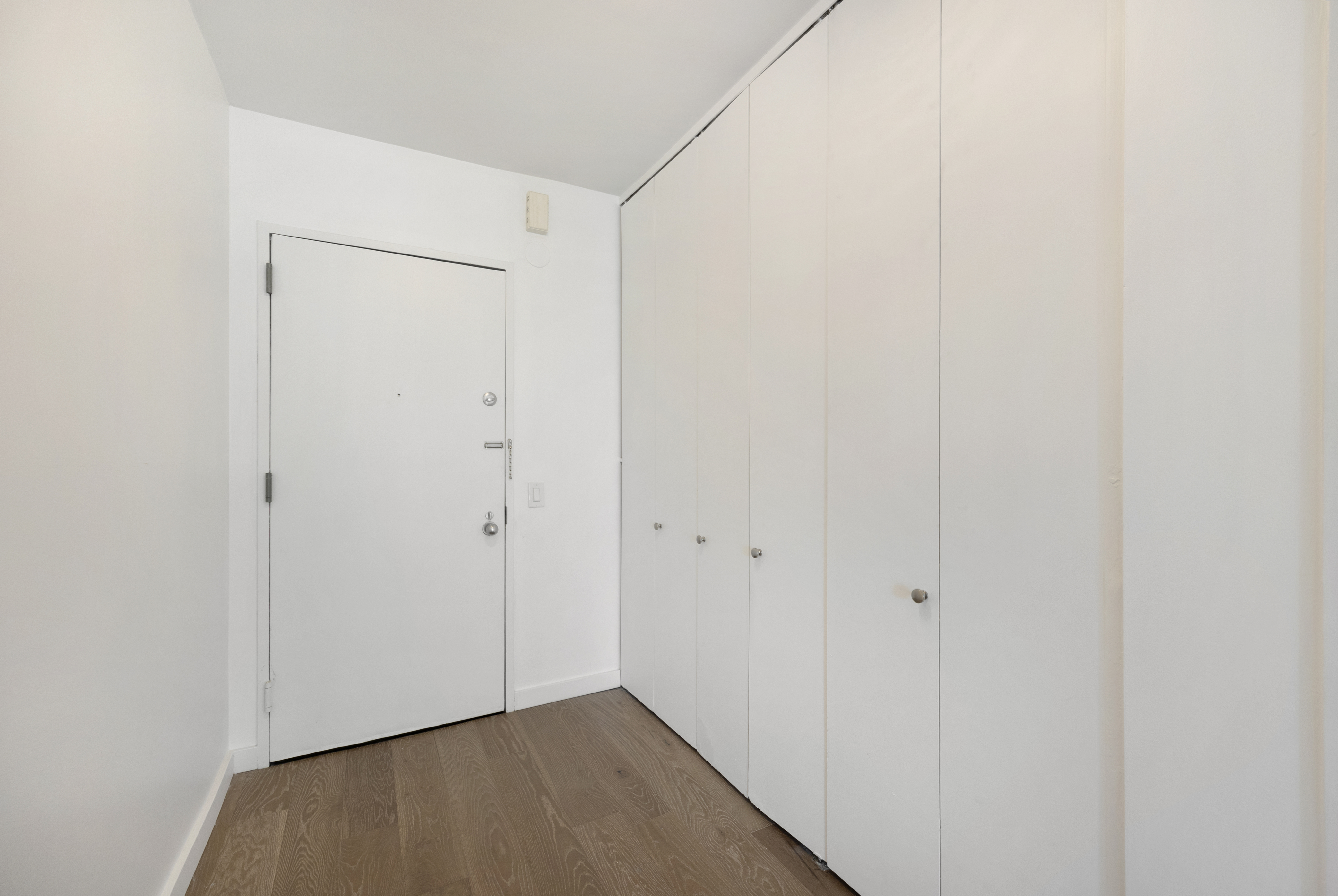 62 West 62nd Street, Unit 18A Manhattan, NY 10023 - Photo 12 of 16 a view of an empty room