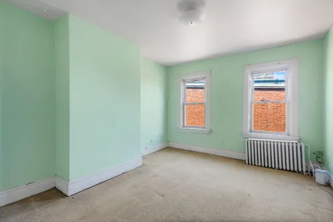 a view of a hallway with workspace