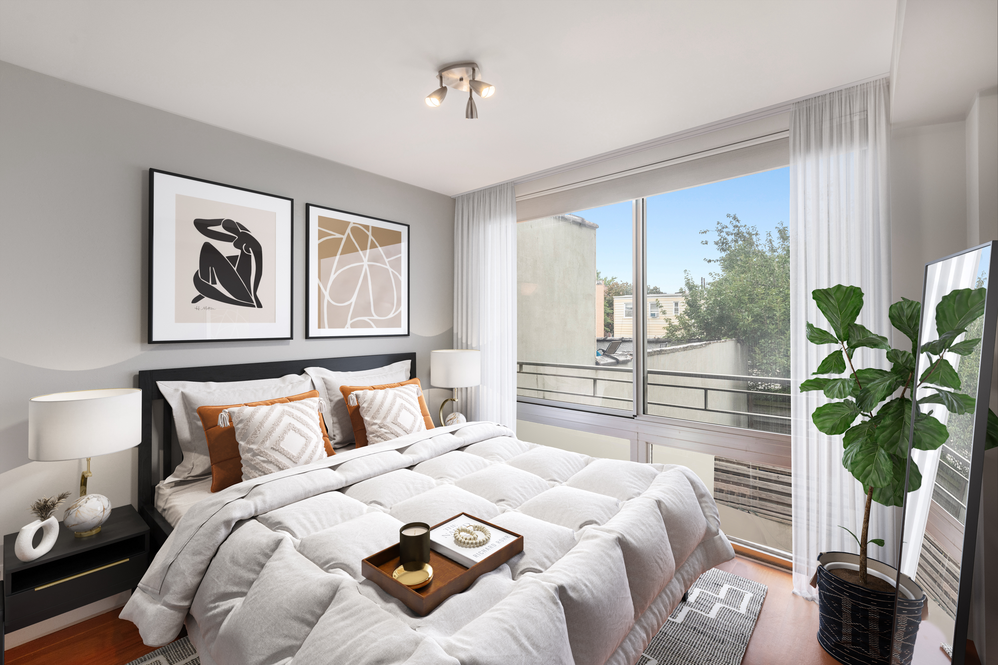 185 13th Street, Unit 2B Brooklyn, NY 11215 - Photo 2 of 8 a bedroom with a large bed and a potted plant