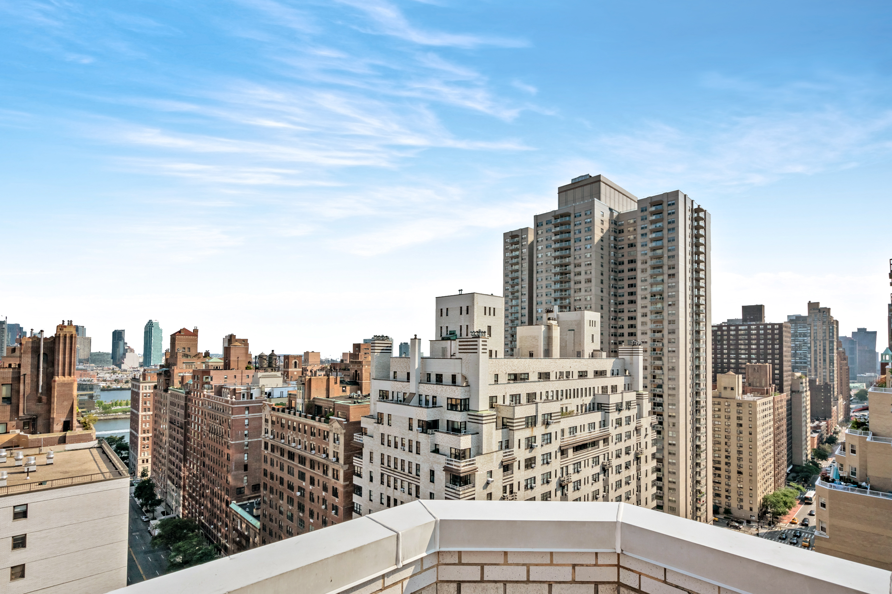 357 East 57th Street, Unit 10C Manhattan, NY 10022 - Photo 8 of 12 a view of a city with tall buildings