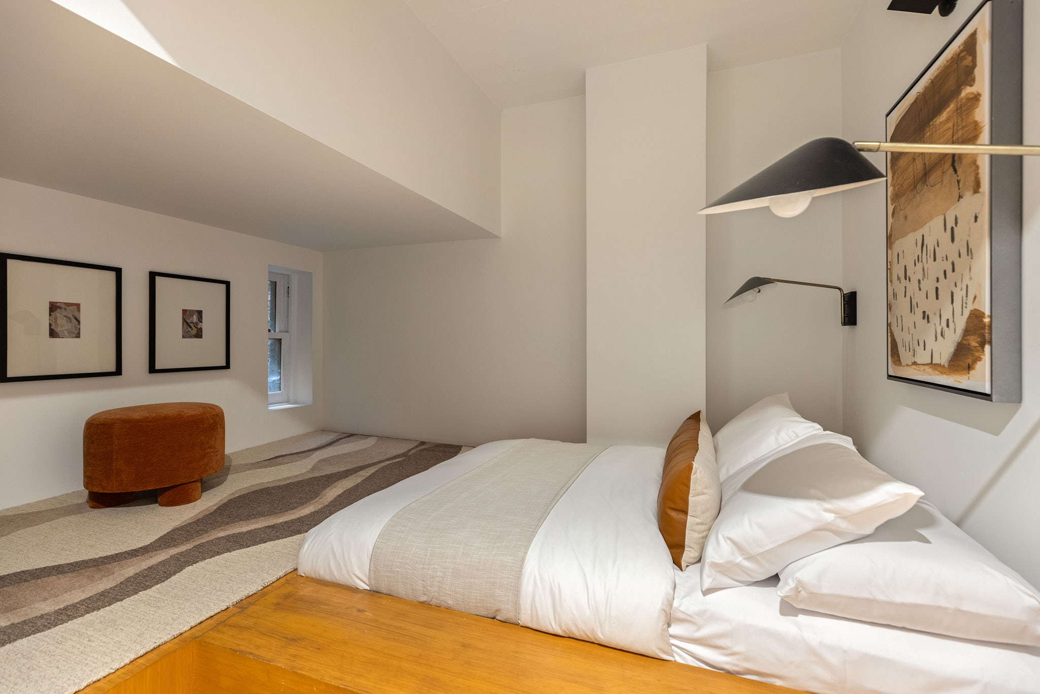 377 West 11th Street, Unit 1D Manhattan, NY 10014 - Photo 17 of 22 a bedroom with a bed and a painting on the wall