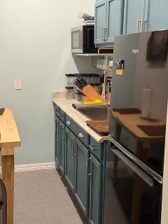 a bathroom with a toilet and a sink