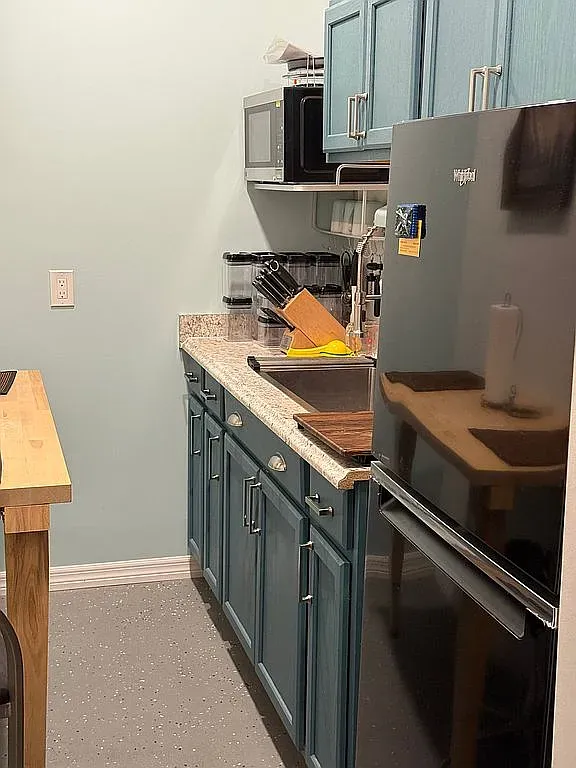 a bathroom with a toilet and a sink