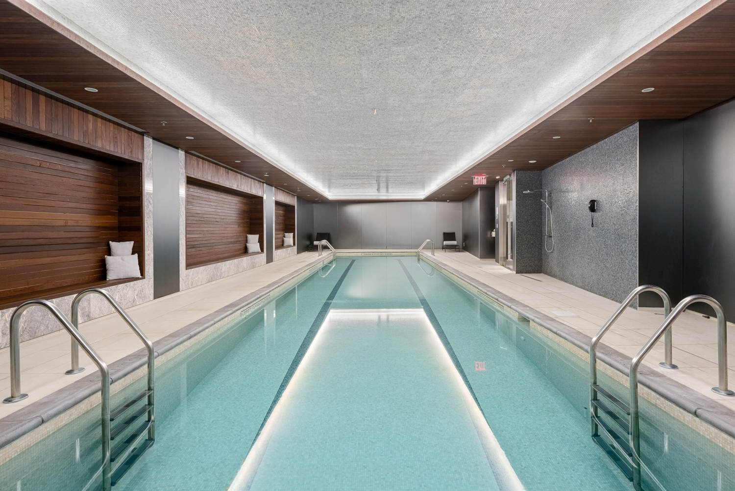 91 Leonard Street, Unit 4A Manhattan, NY 10013 - Photo 13 of 22 a view of a living room with kitchen