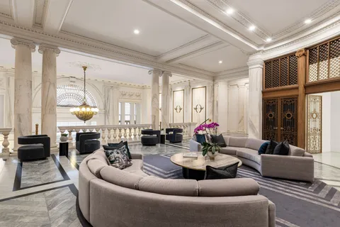 a living room with furniture and window