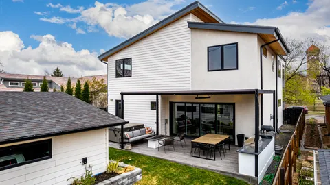 a backyard of a house with seating space