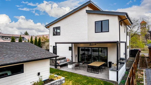 a backyard of a house with seating space
