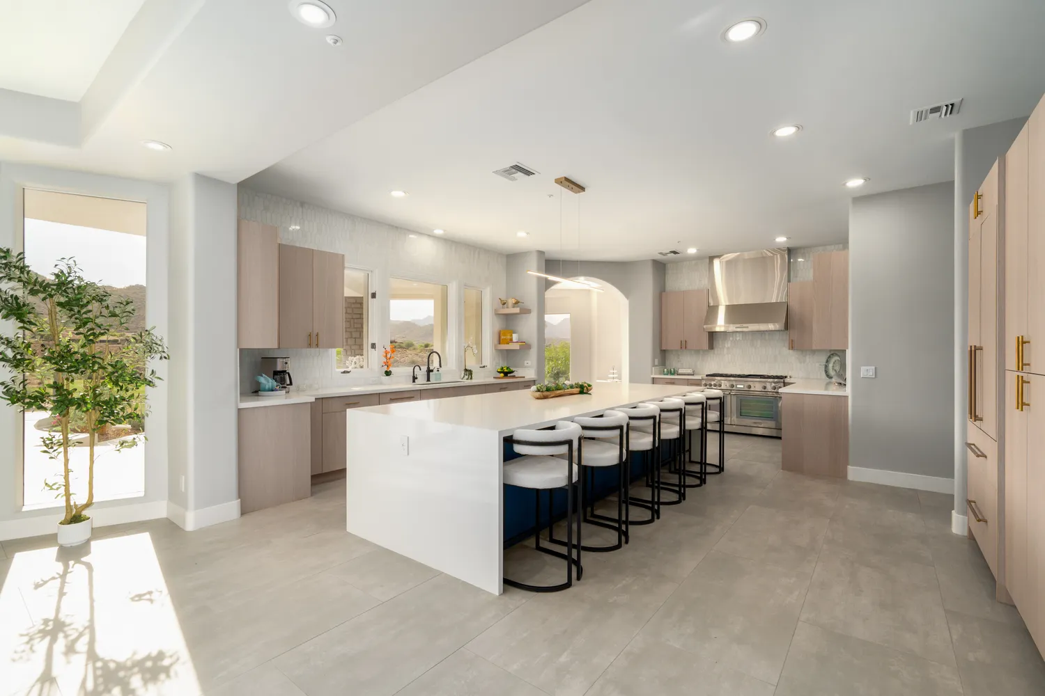a kitchen with a sink cabinets and appliances