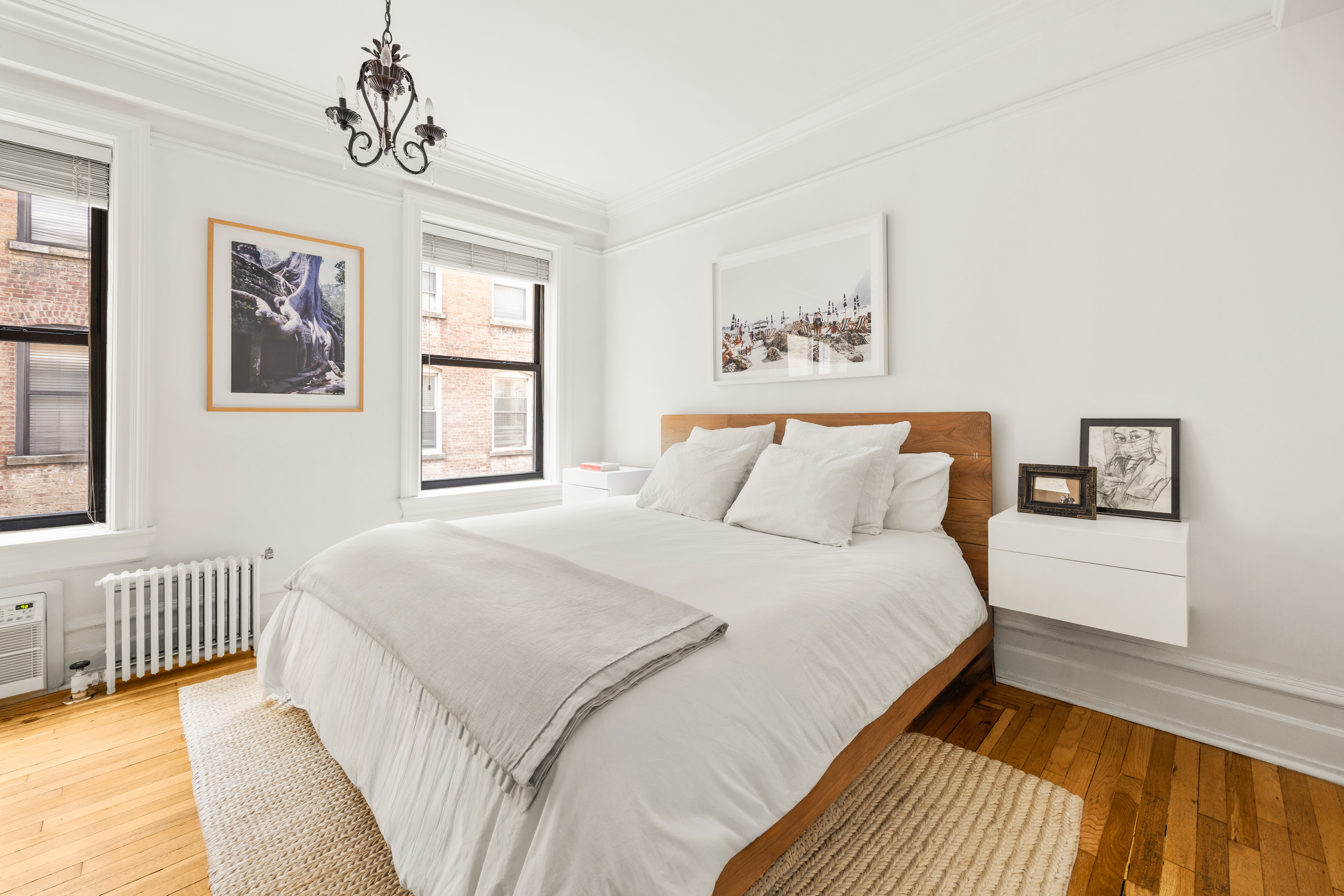 150 West 87th Street, Unit 7C Manhattan, NY 10024 - Photo 8 of 18 a bedroom with a bed and a window