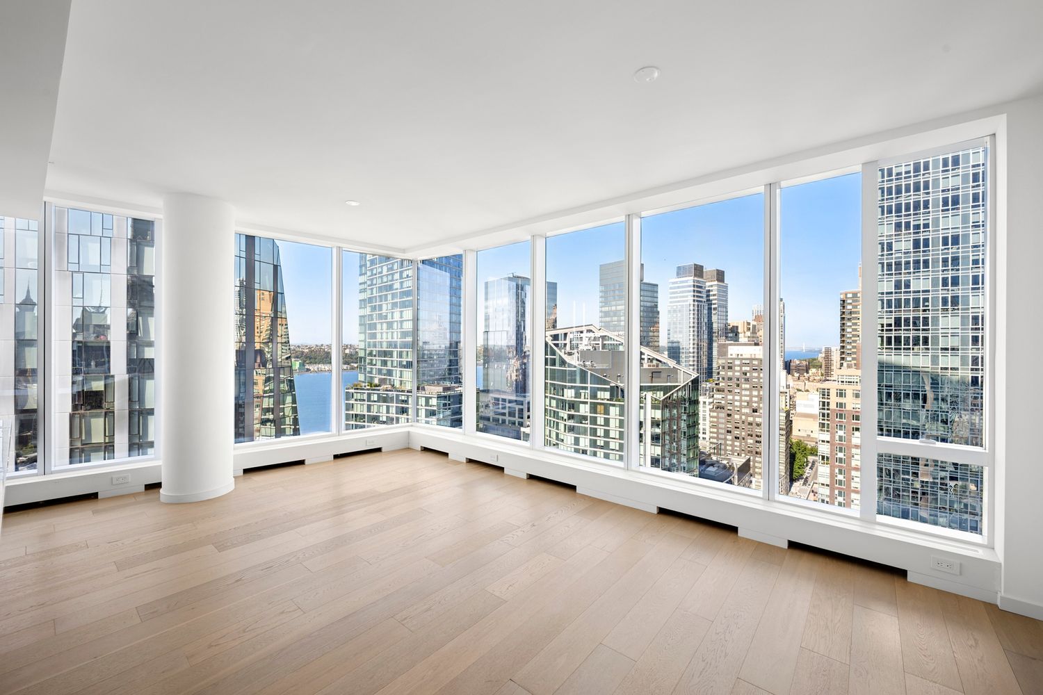 a view of room with floor to ceiling window and an outdoor space