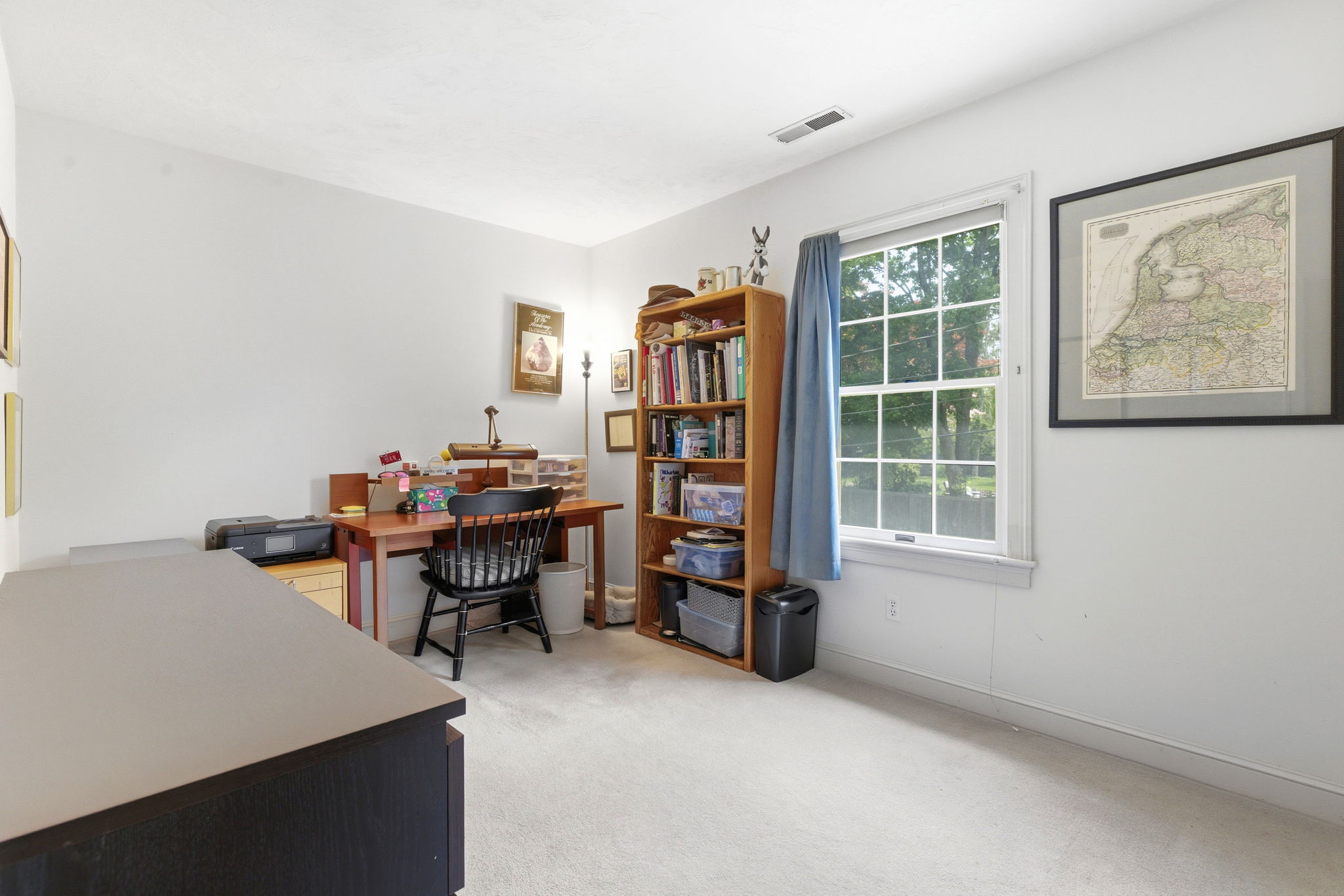 2 Laurel Street Lexington, MA 02421 - Photo 35 of 46 a view of a workspace with furniture and a window