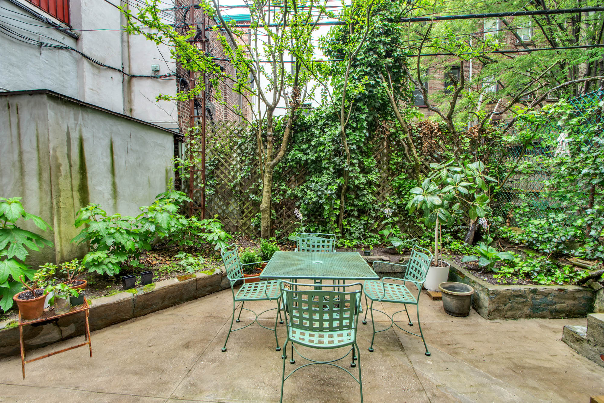 545 10th Street Brooklyn, NY 11215 - Photo 7 of 11 a backyard of a house with outdoor seating