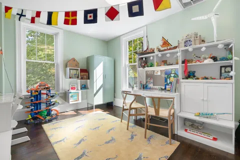 a room with furniture and a wooden floor