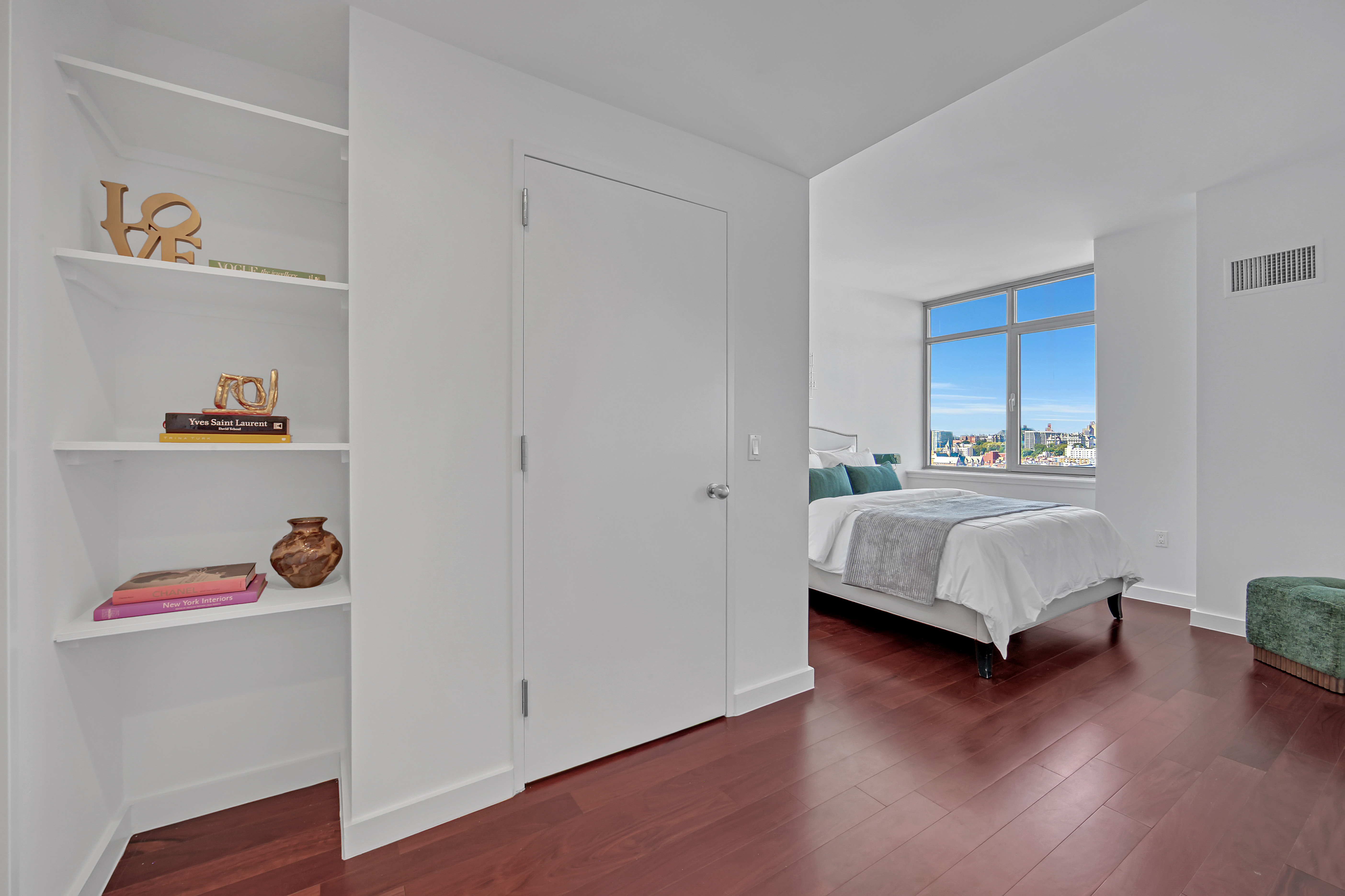 1485 5th Avenue, Unit 18/19H Manhattan, NY 10035 - Photo 11 of 24 a bedroom with a bed and a window