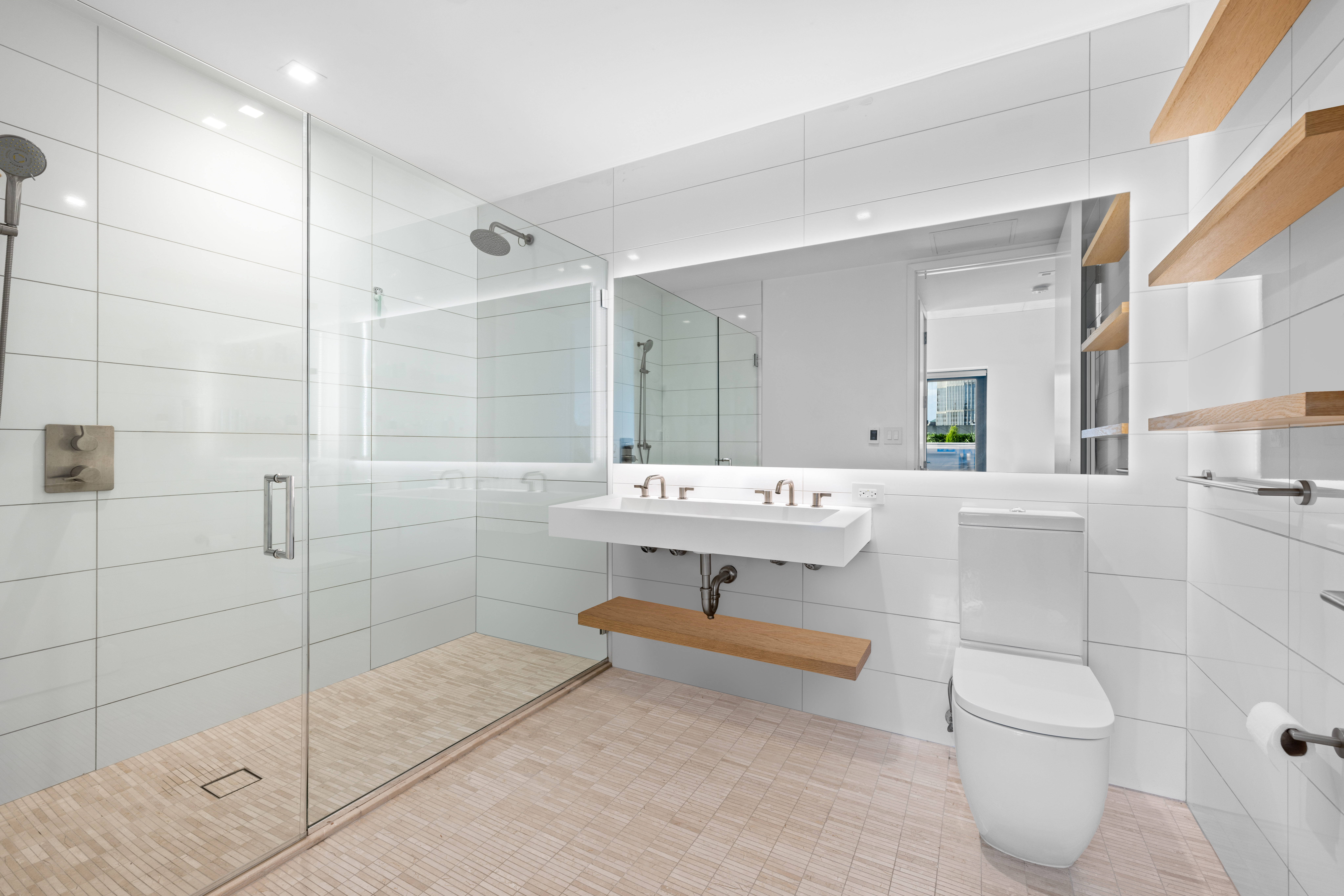 98 Front Street, Unit PH Brooklyn, NY 11201 - Photo 11 of 26 a bathroom with a sink toilet and shower