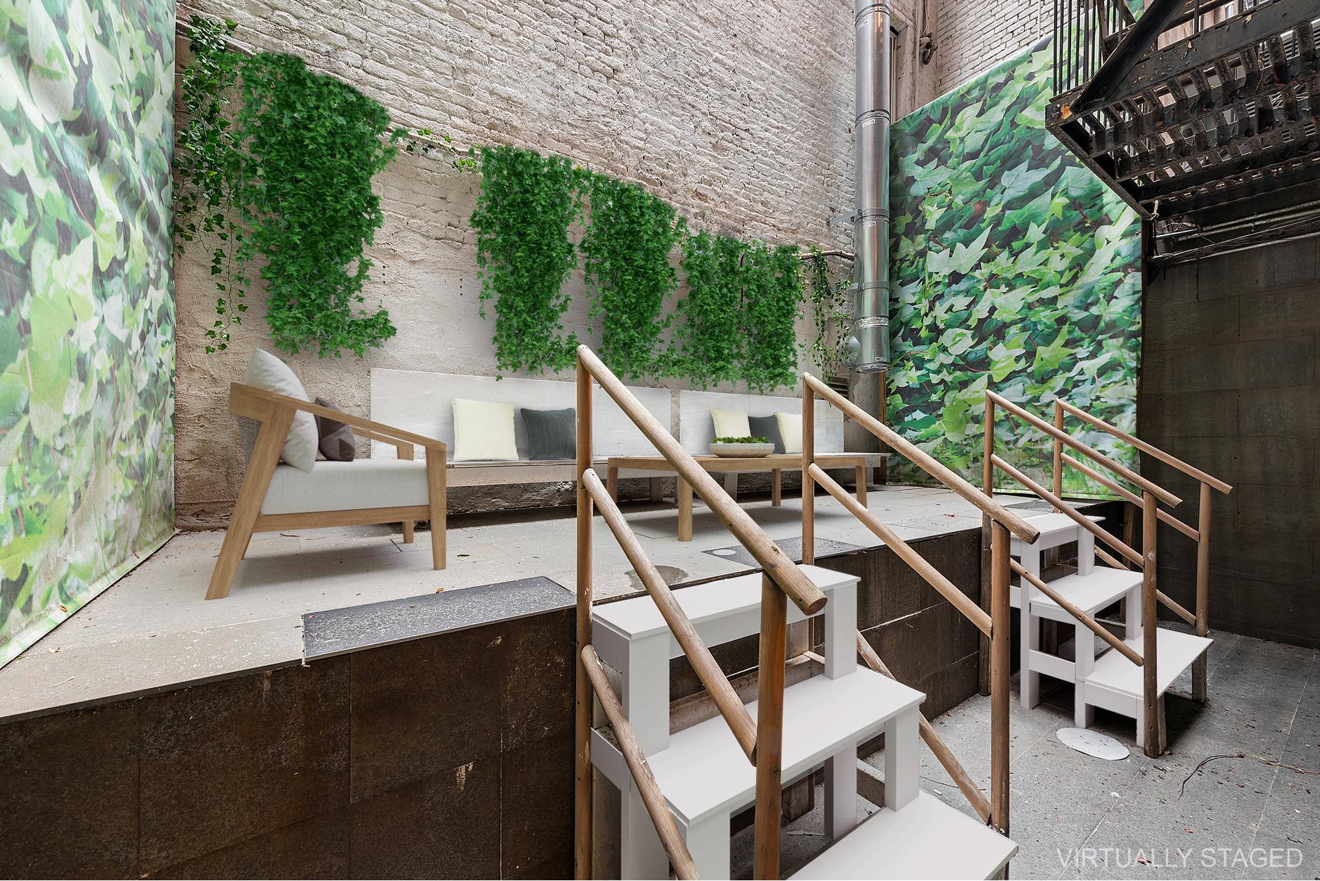 53 Murray Street, Unit 1 Manhattan, NY 10007 - Photo 15 of 15 a roof deck with wooden floor and fence