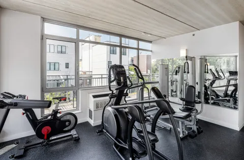 a view of a room with gym equipment