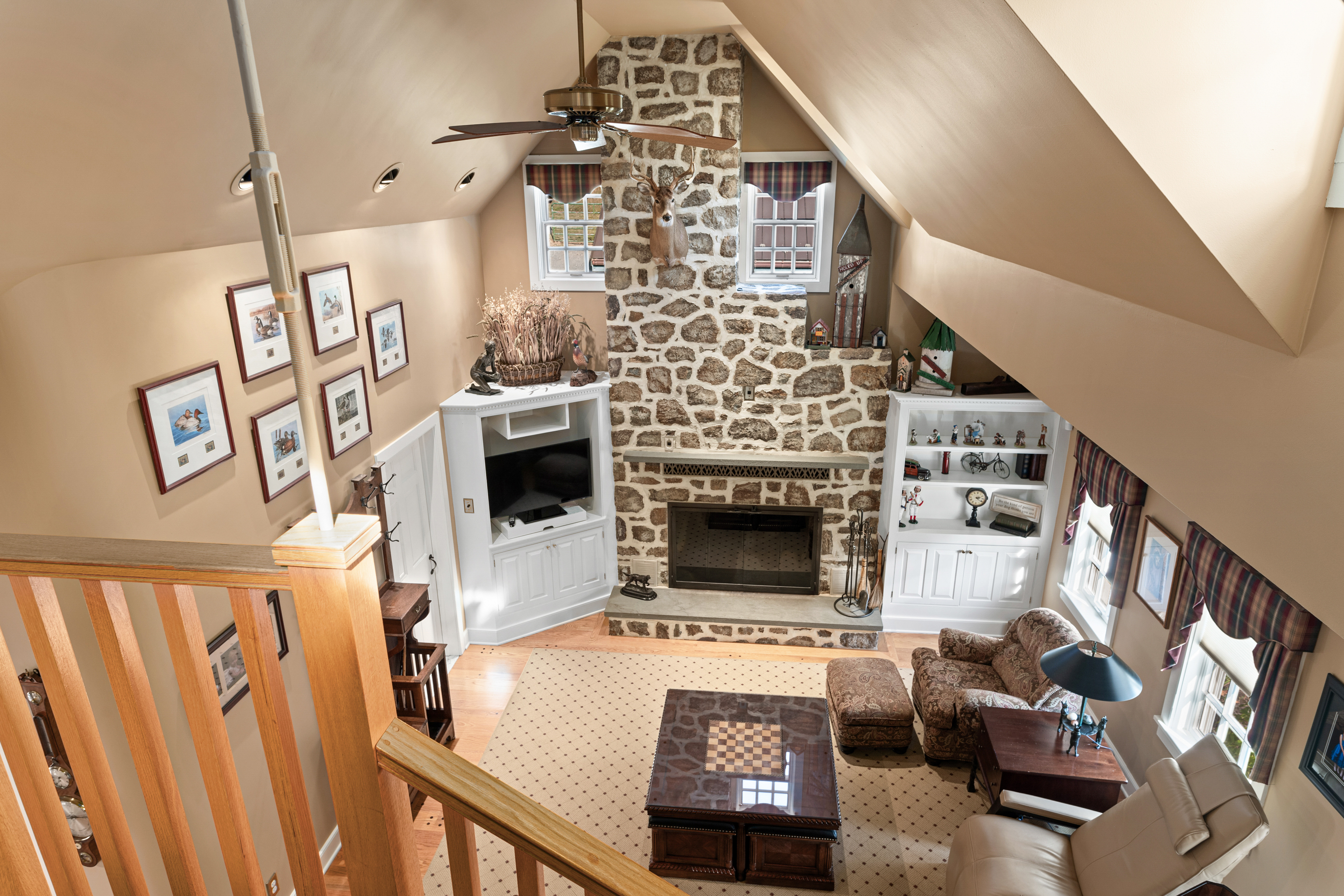 791 Grubbs Mill Road Berwyn, PA 19312 - Photo 23 of 76 a living room with furniture and a fireplace