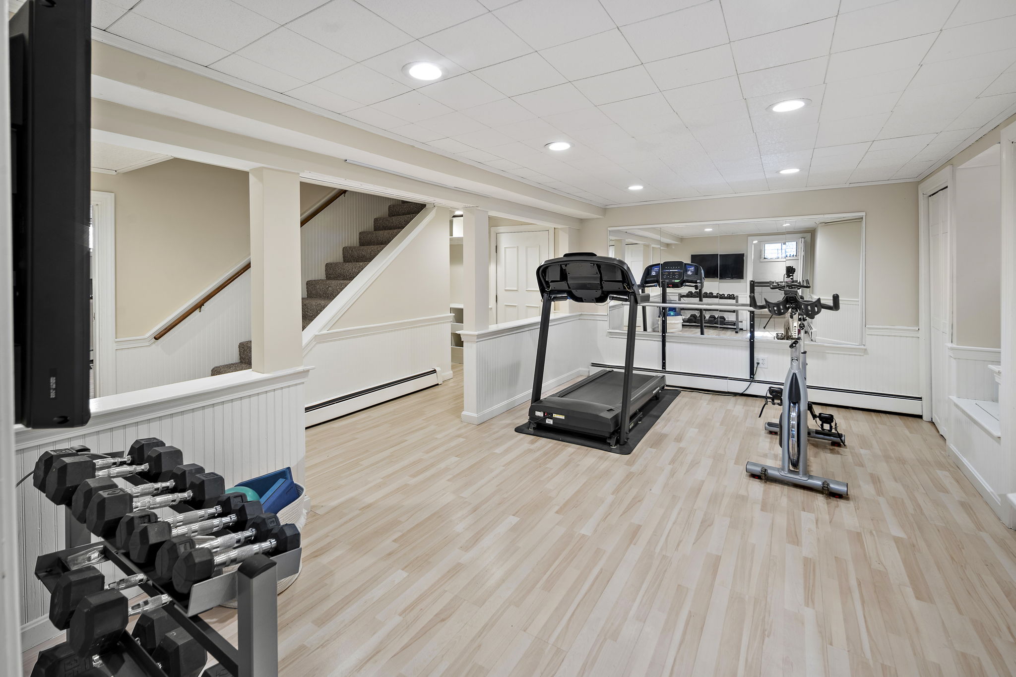 56 Jefferson Road Winchester, MA 01890 - Photo 21 of 26 a view of a room with gym equipment