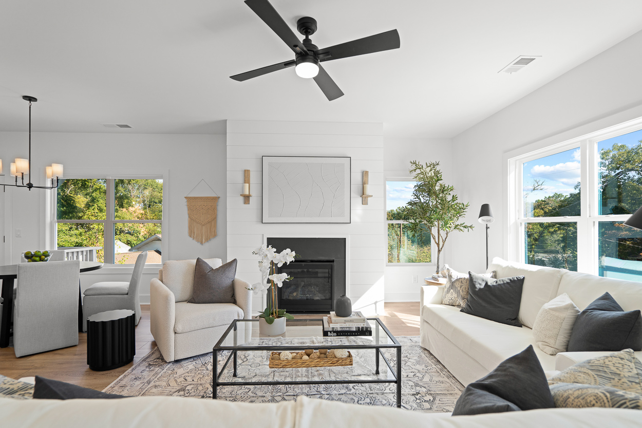 369 Kings Landing Atlanta, GA 30354 - Photo 10 of 41 a living room with furniture a fireplace and a large window