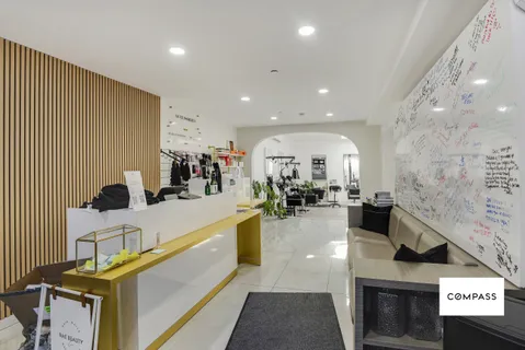 a large white kitchen with lots of counter space