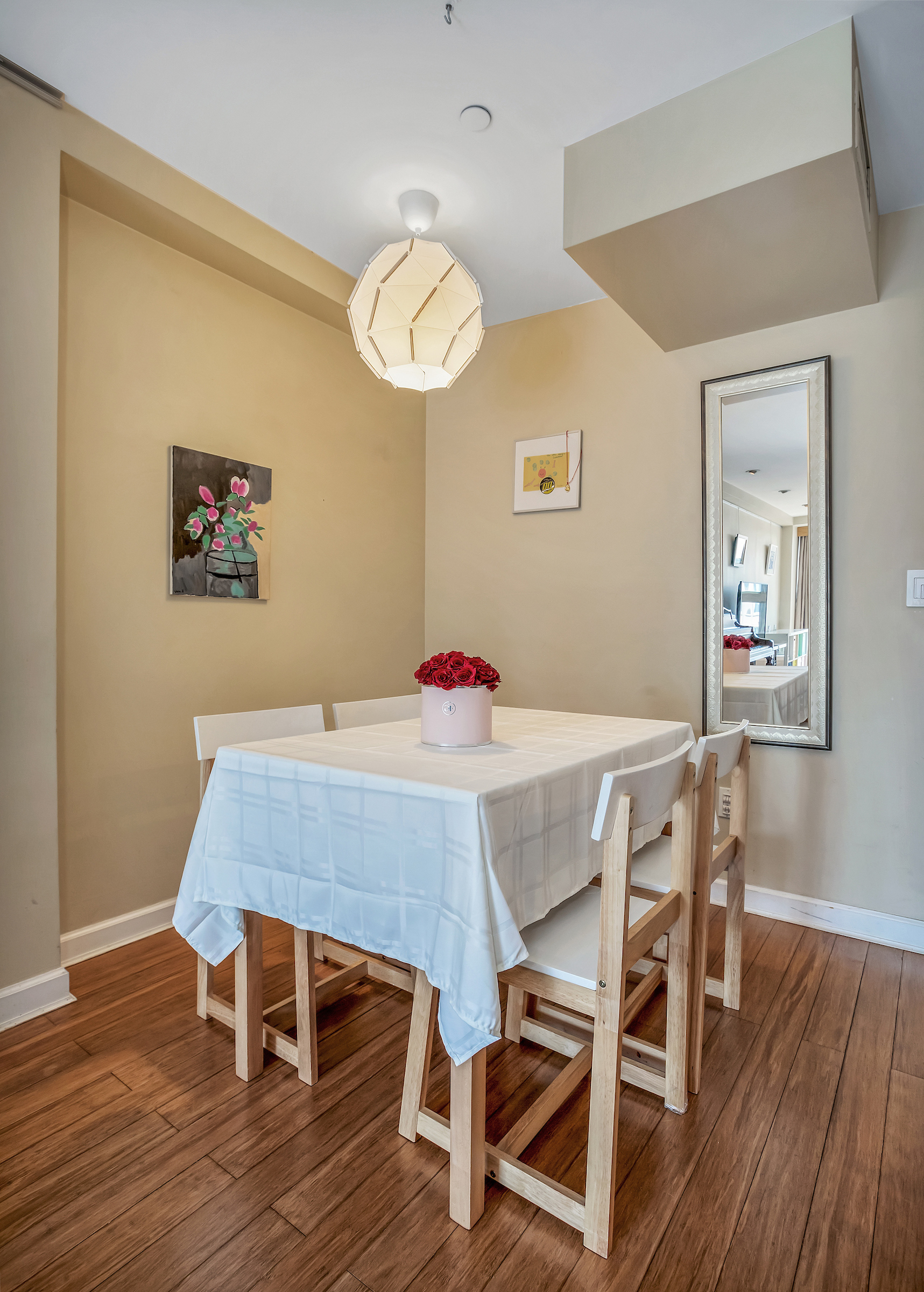 1400 5th Avenue, Unit 8J Manhattan, NY 10026 - Photo 2 of 10 a view of a dining room with furniture and wooden floor