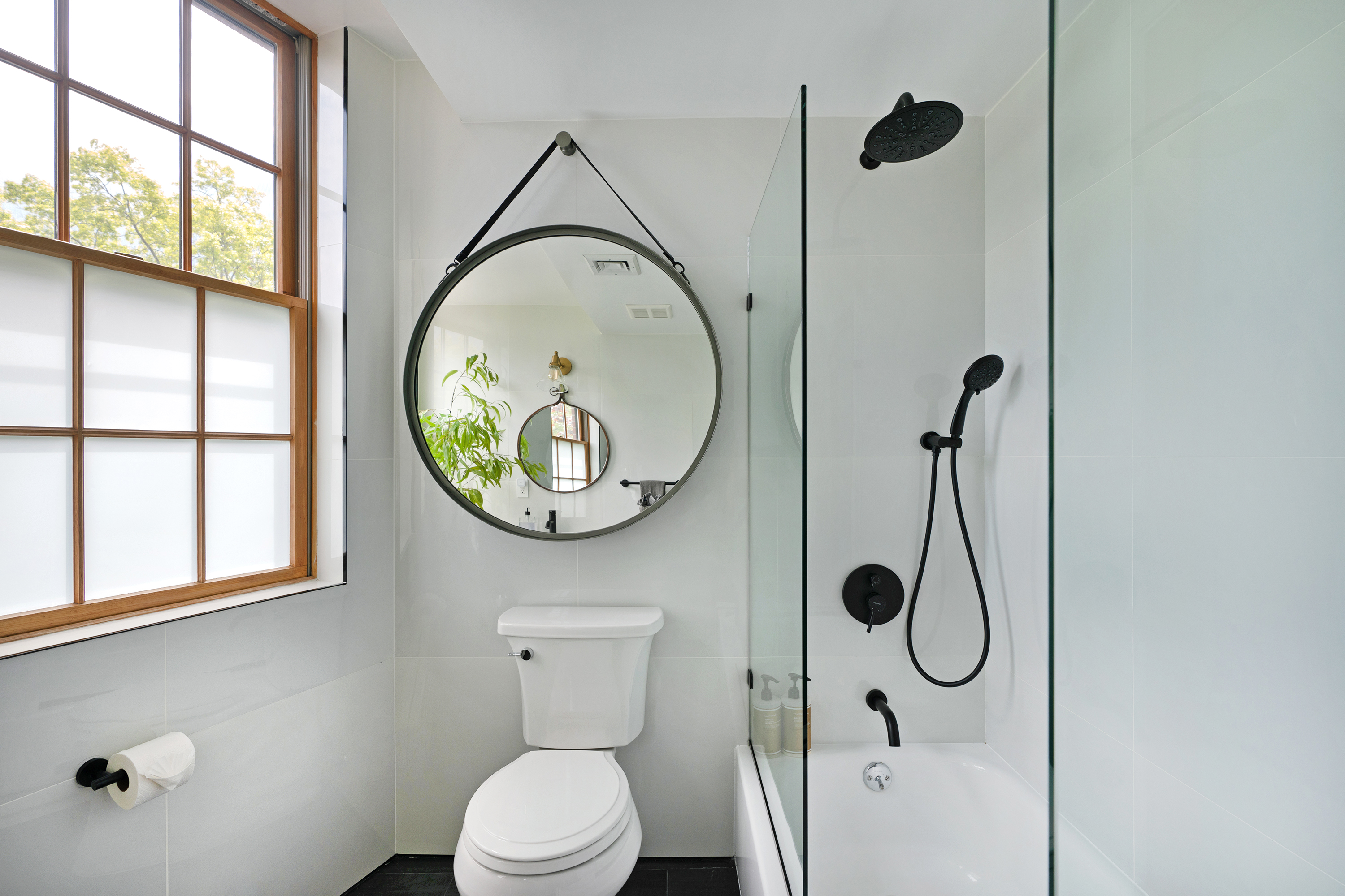 334 Plymouth Street Brooklyn, NY 11201 - Photo 18 of 32 a bathroom with a toilet and a shower