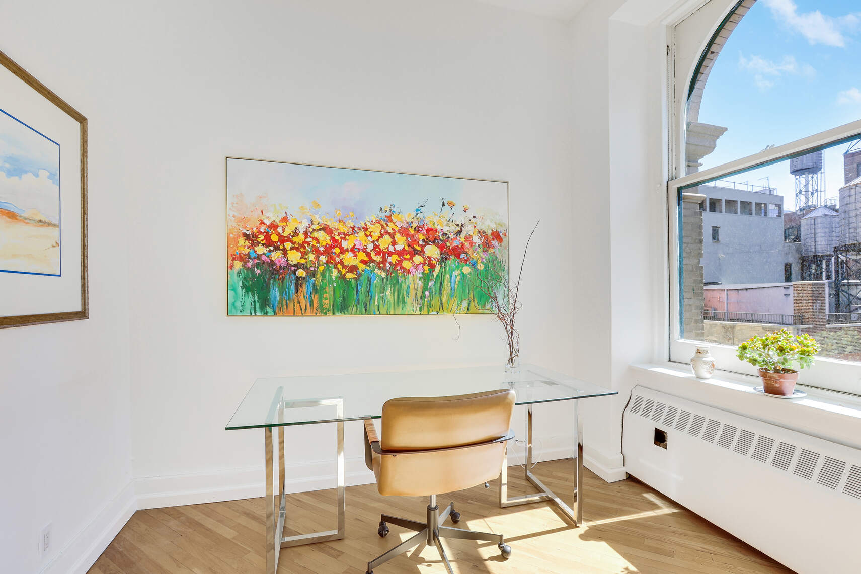 35 East 12th Street, Unit 8C Manhattan, NY 10003 - Photo 5 of 22 a view of a dining room with furniture and a potted plant
