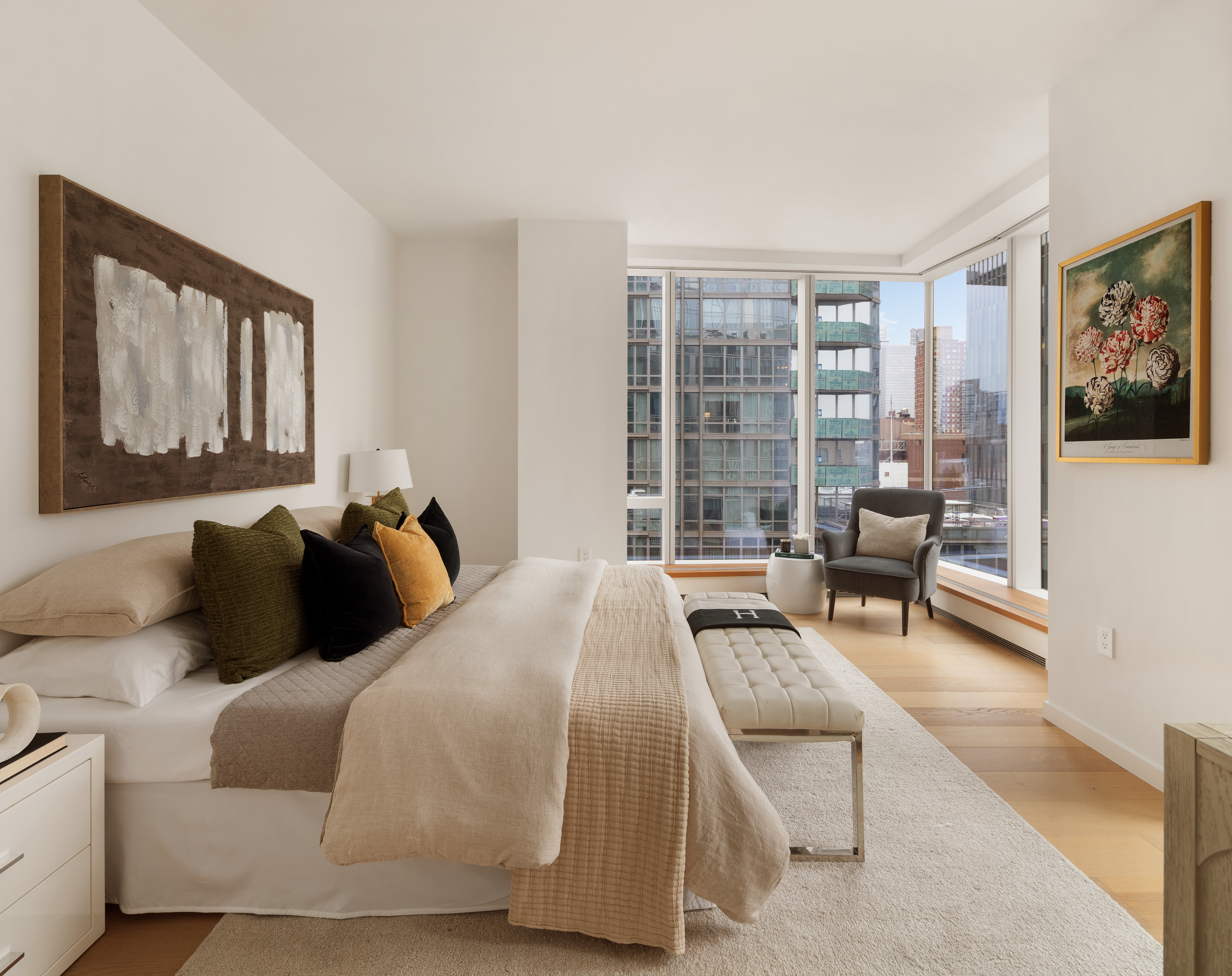 1 West End Avenue, Unit 12D Manhattan, NY 10023 - Photo 6 of 32 a bedroom with a bed and a couch