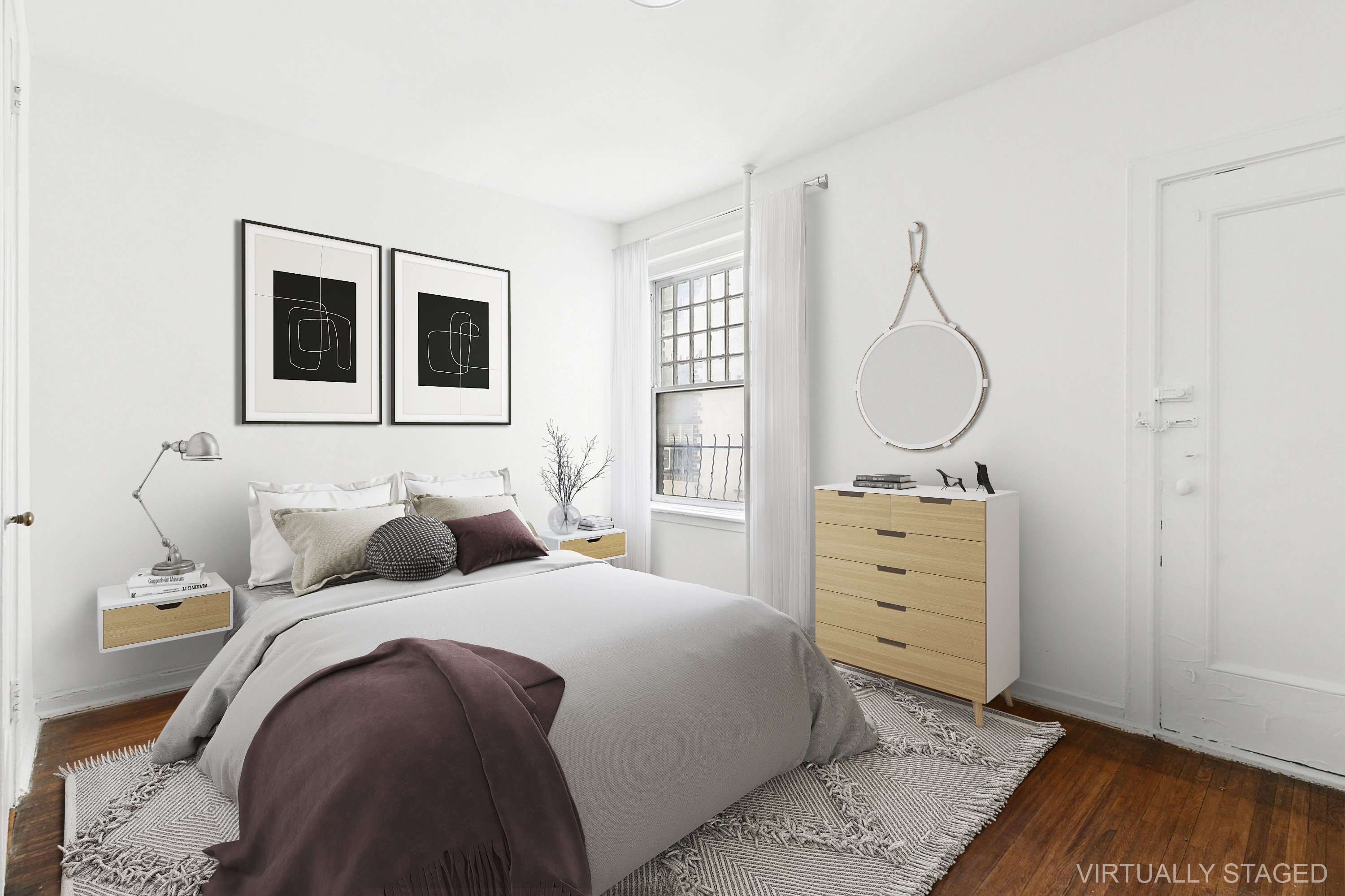 370 Central Park West, Unit 413 Manhattan, NY 10025 - Photo 7 of 19 a bedroom with a bed and wooden floor