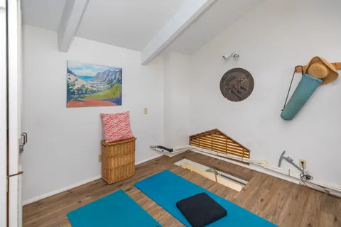 a room with furniture and a window