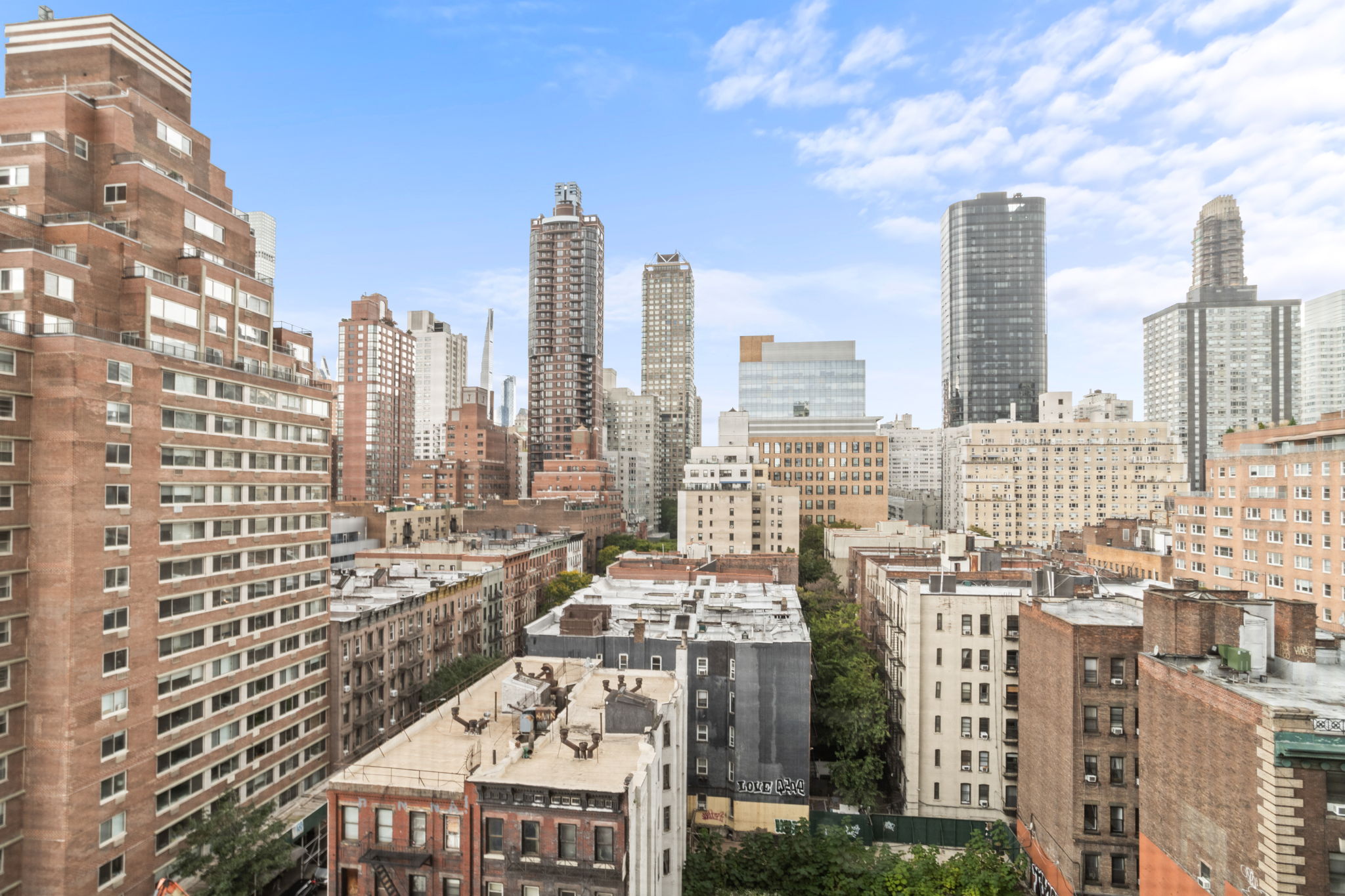 401 East 65th Street, Unit 12F Manhattan, NY 10065 - Photo 10 of 18 a view of city with tall buildings