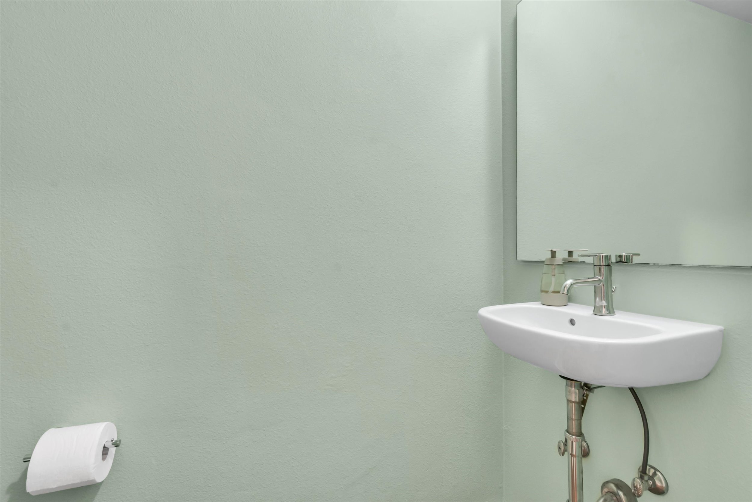 3601 Las Colinas Drive, Unit C Austin, TX 78731 - Photo 15 of 33 a bathroom with a sink and a mirror