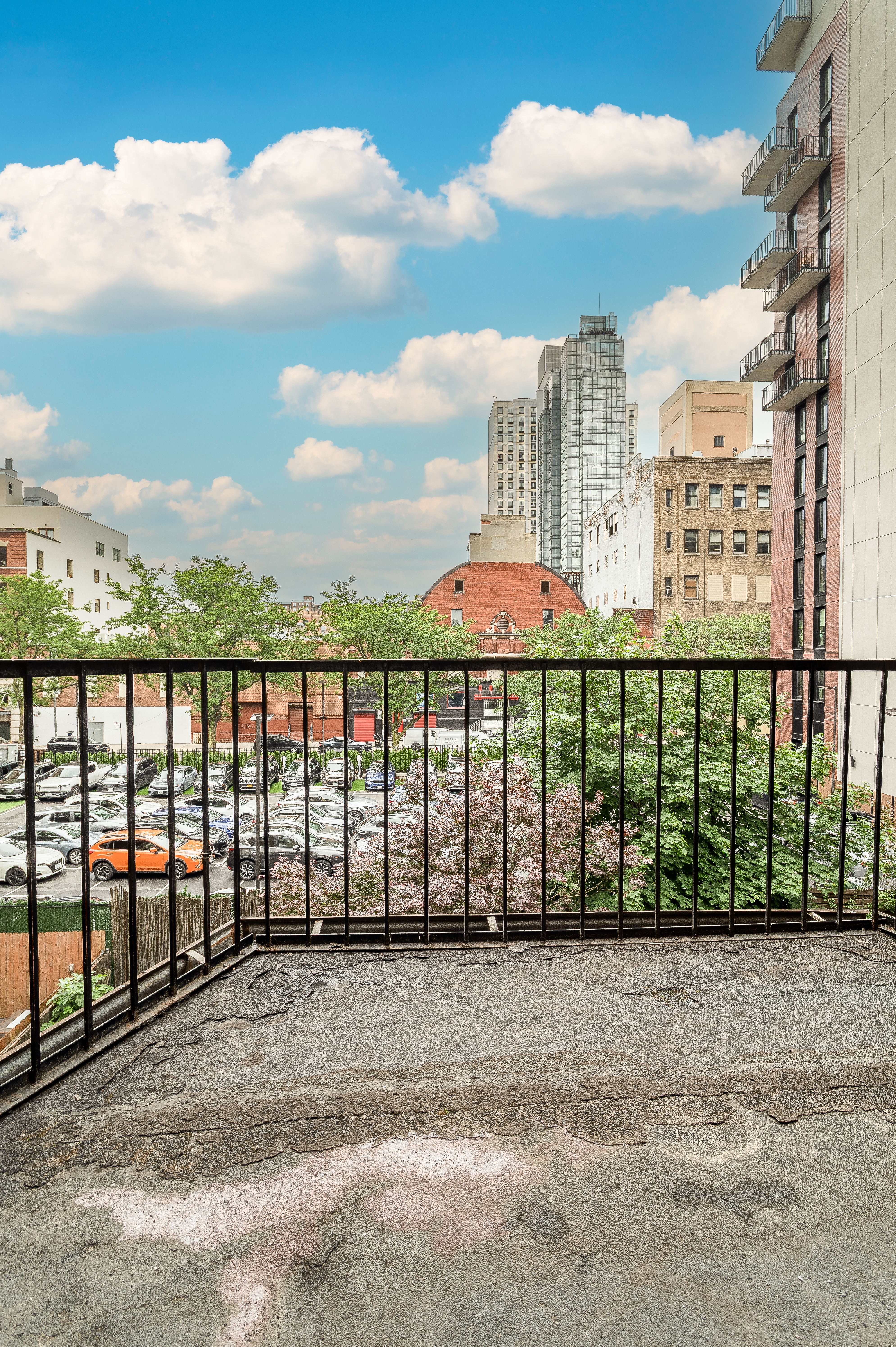 a view of a street with outdoor seating