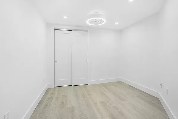 74 Leonard Street, Unit 5B Manhattan, NY 10013 - Photo 4 of 6 a view of an empty room
