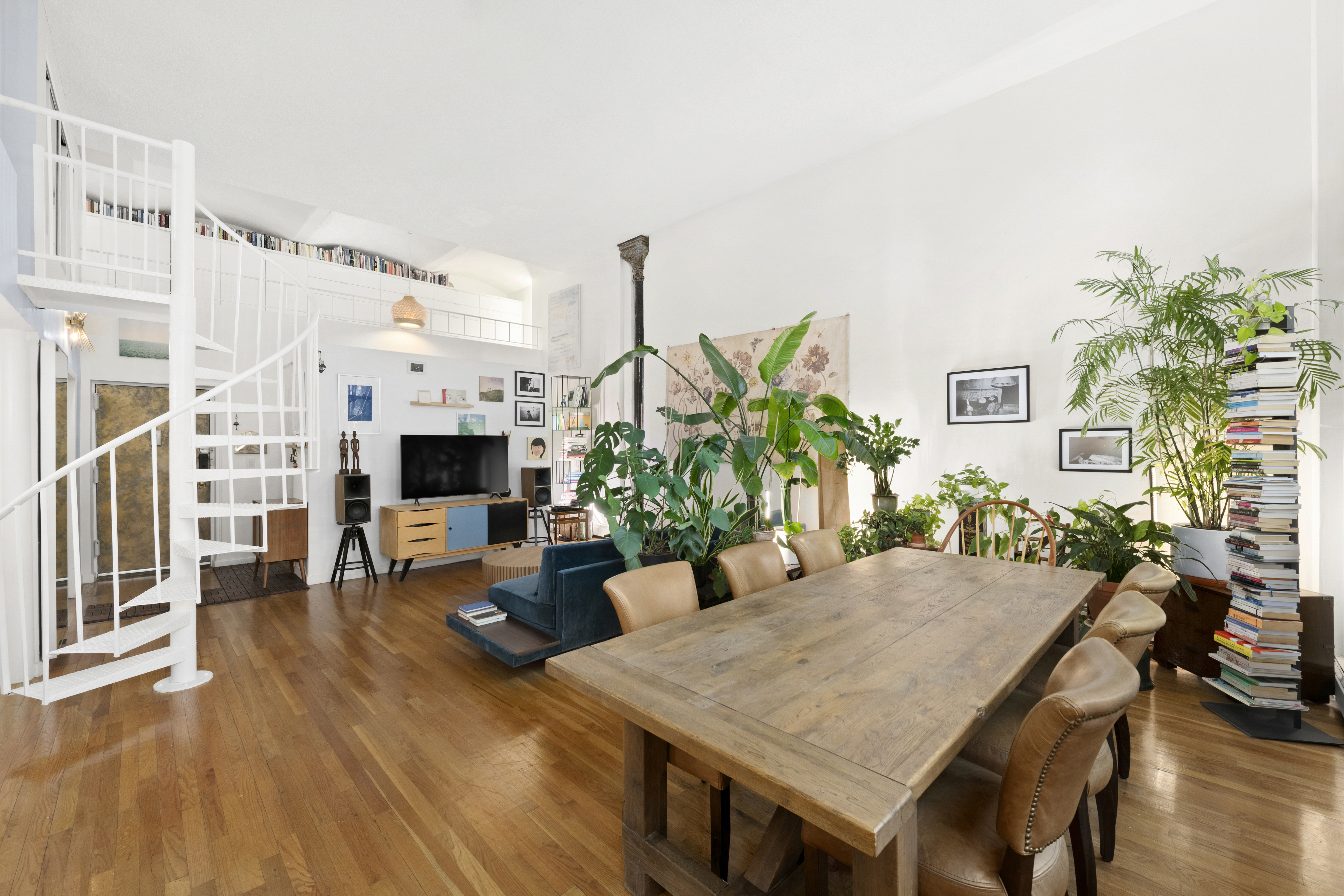 309 East 108th Street, Unit 2/D Manhattan, NY 10029 - Photo 3 of 12 a view of a dining room with furniture and wooden floor