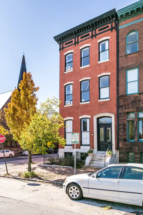 front view of house and car parked
