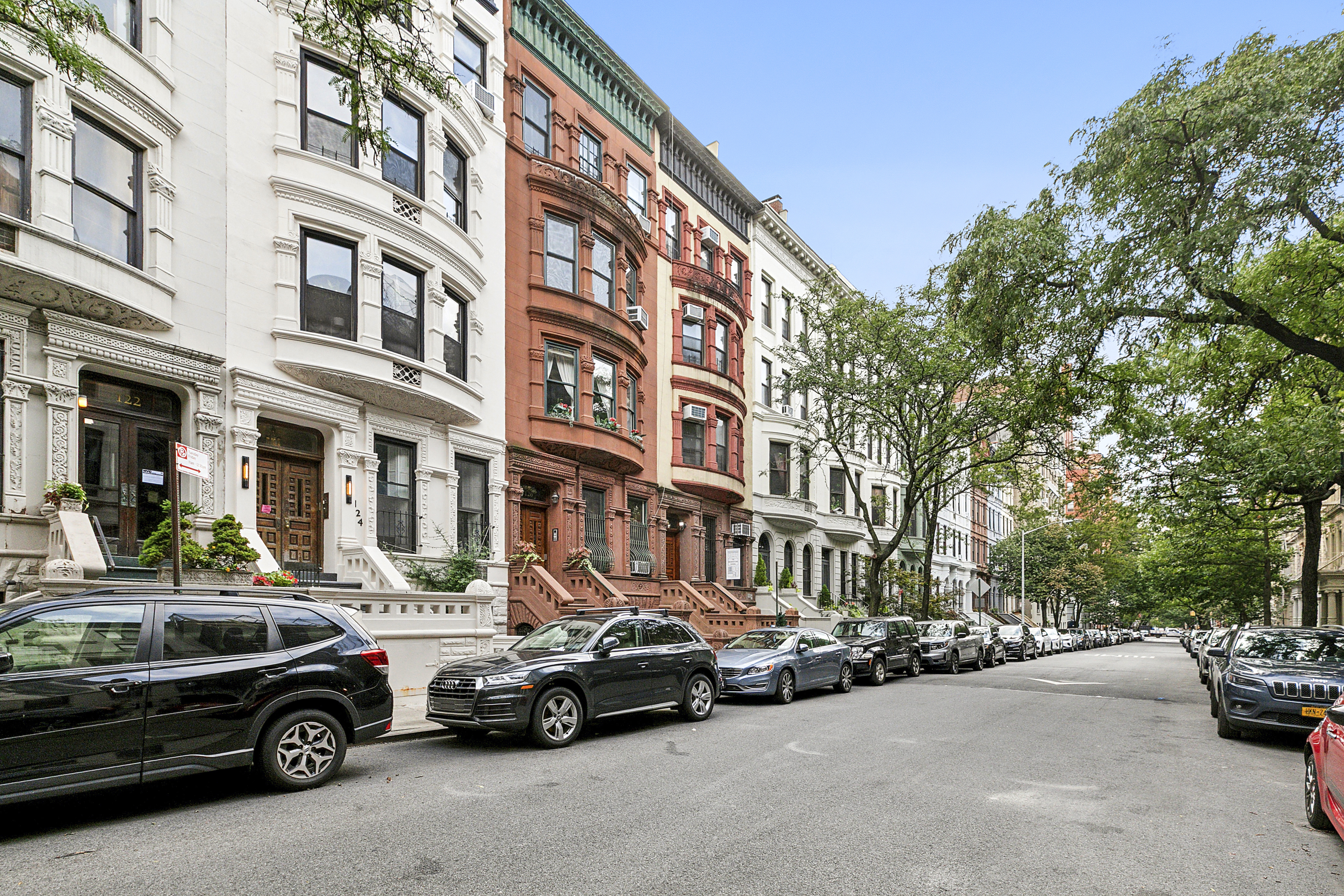 122 West 80th Street, Unit 3F Manhattan, NY 10024 - Photo 6 of 7 a car parked in front of a building