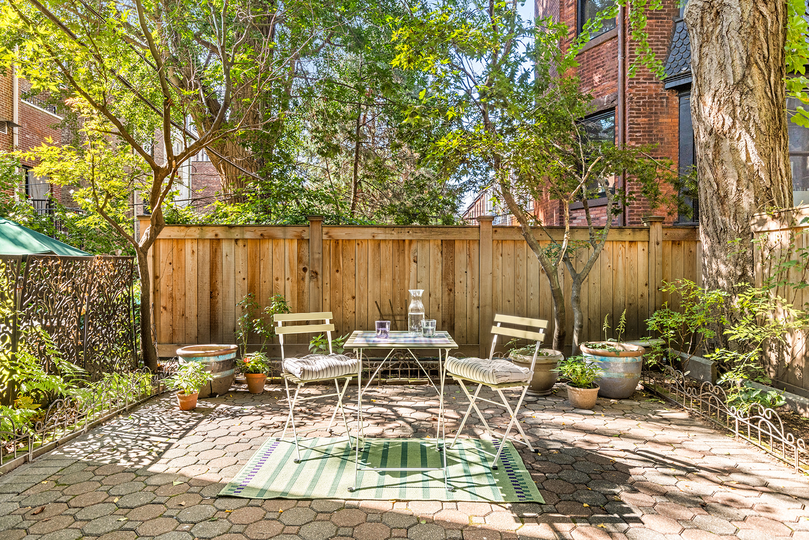 102 Prospect Park West, Unit 2 Brooklyn, NY 11215 - Photo 3 of 12 a view of a lake with a table and chairs