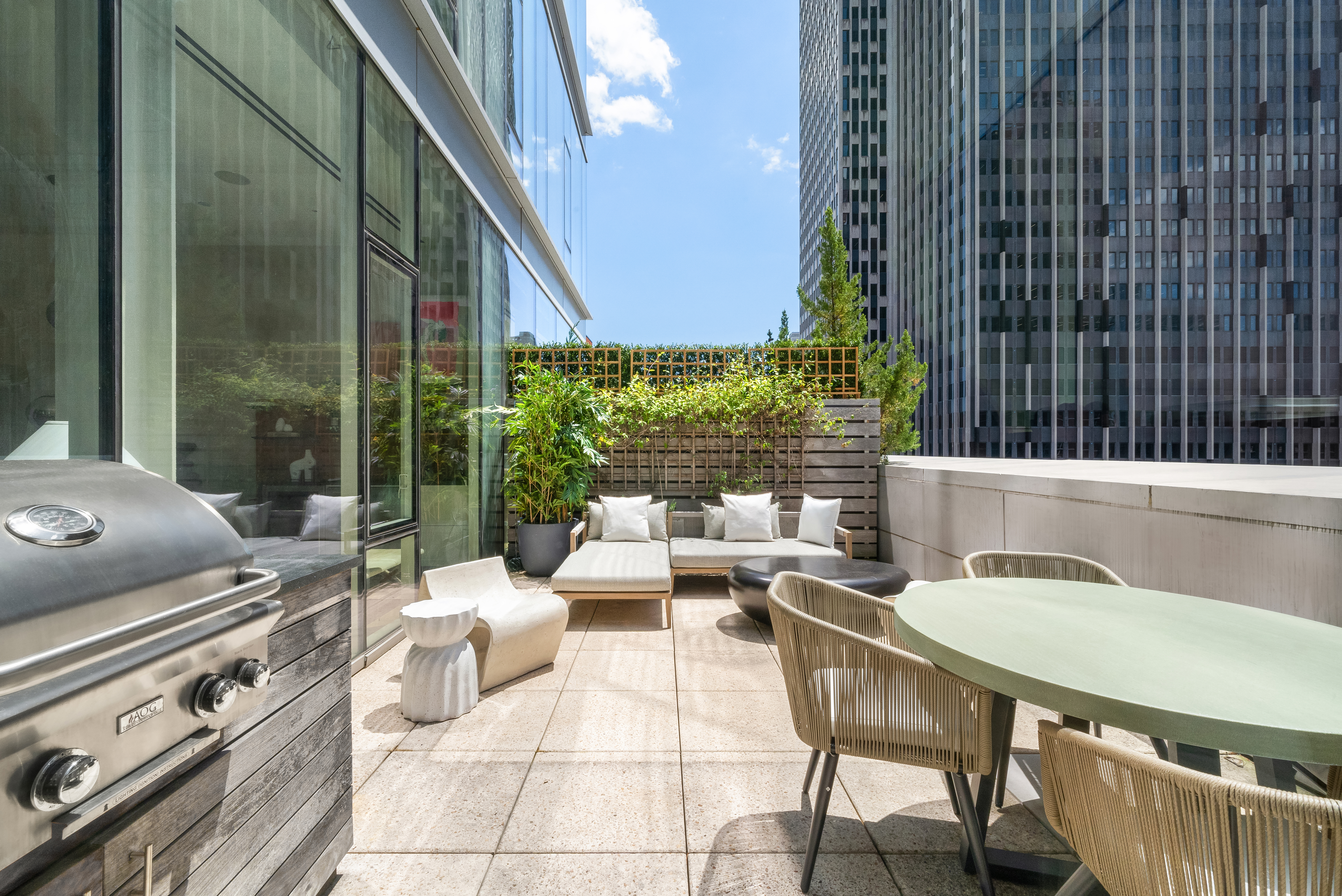 93 Worth Street, Unit PH5 Manhattan, NY 10013 - Photo 5 of 19 a outdoor space with patio couch and a potted plant