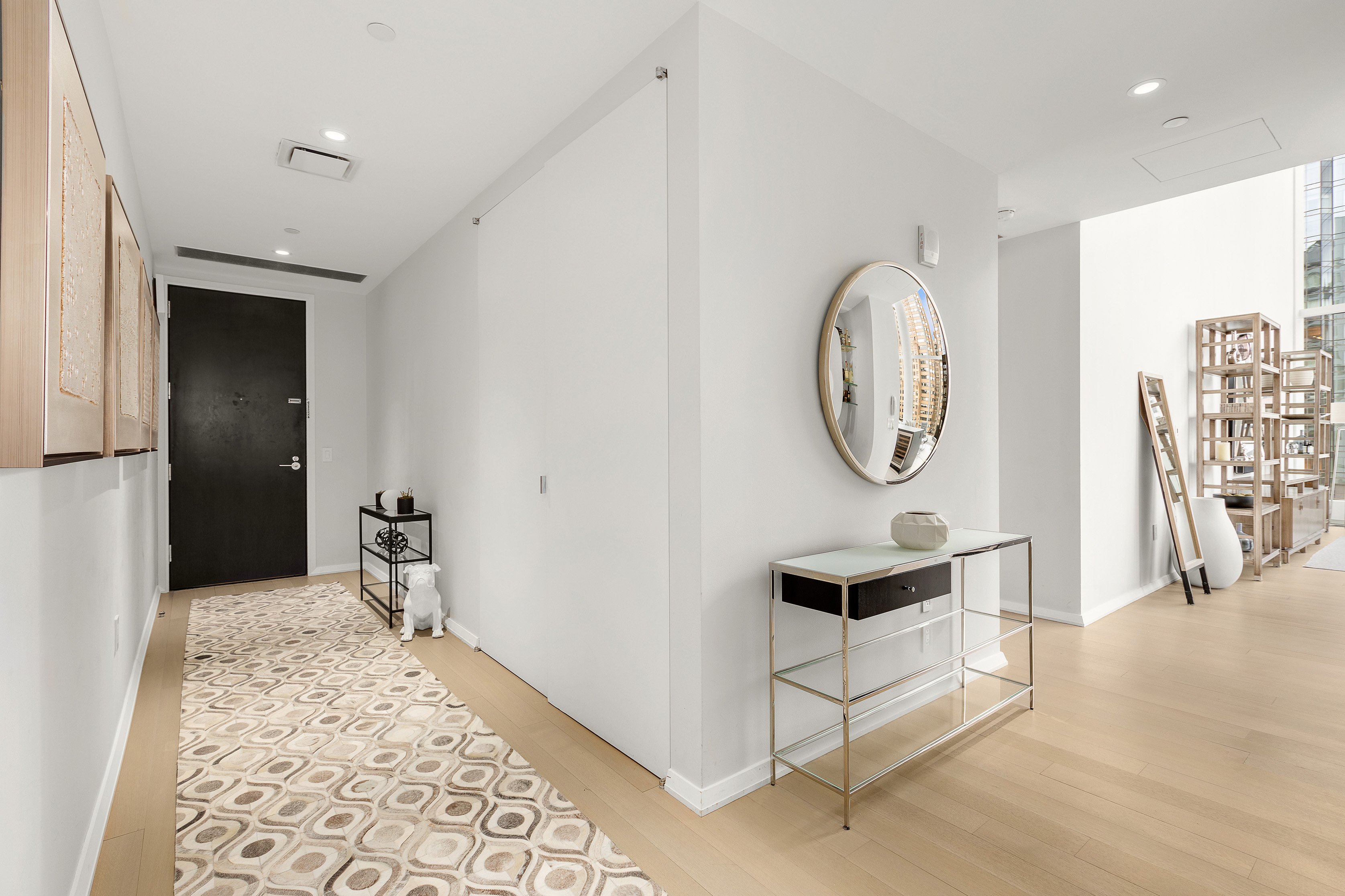 50 West Street, Unit 14B Manhattan, NY 10006 - Photo 14 of 29 a very nice looking room with a large window