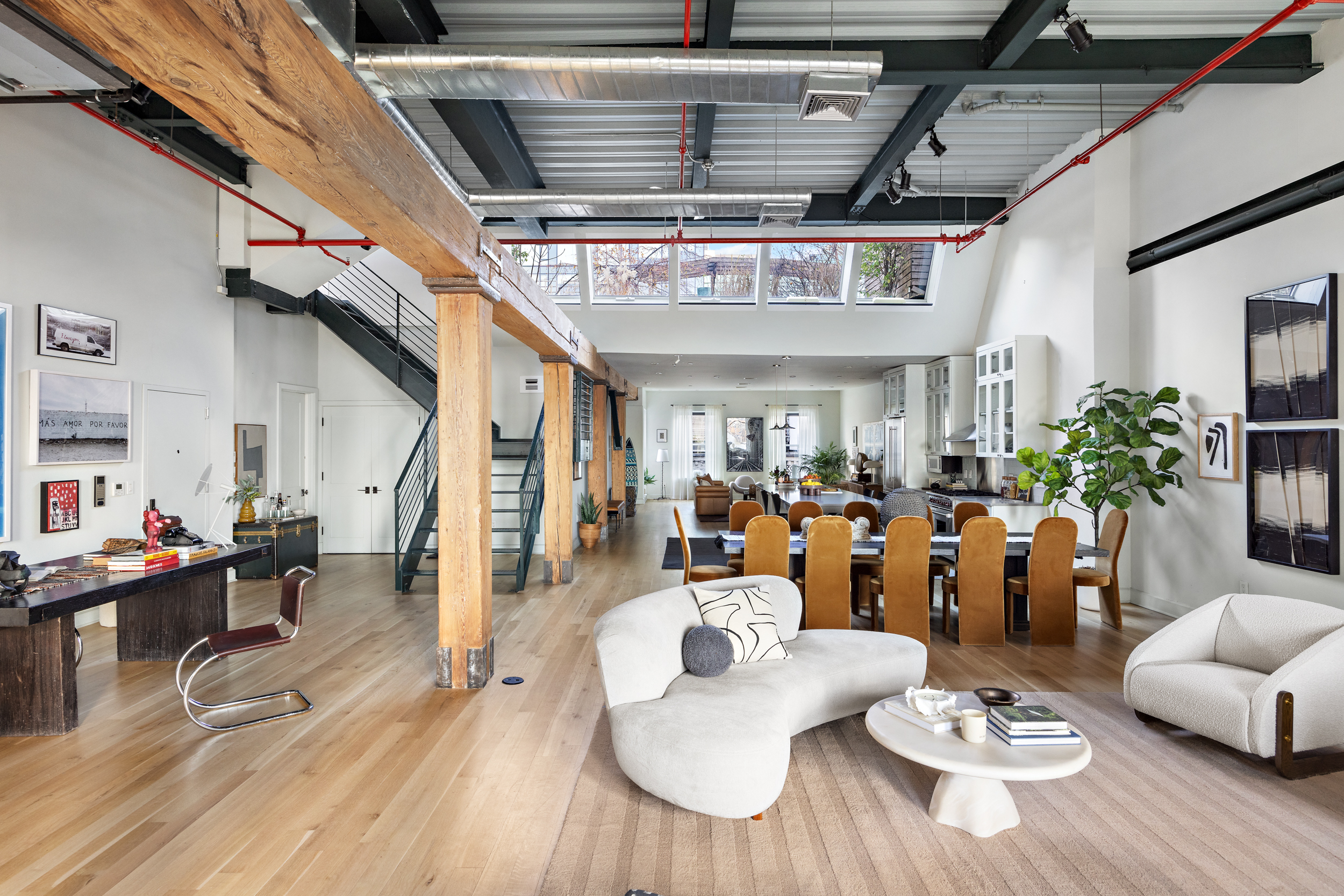 481 Washington Street, Unit PHS Manhattan, NY 10013 - Photo 4 of 20 a living room with furniture and wooden floor
