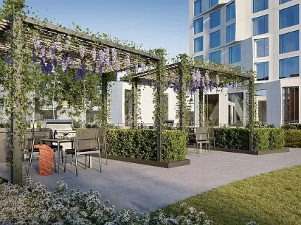a view of a chairs and table in a patio