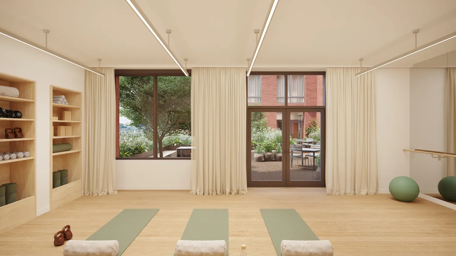 a bedroom with furniture and large windows