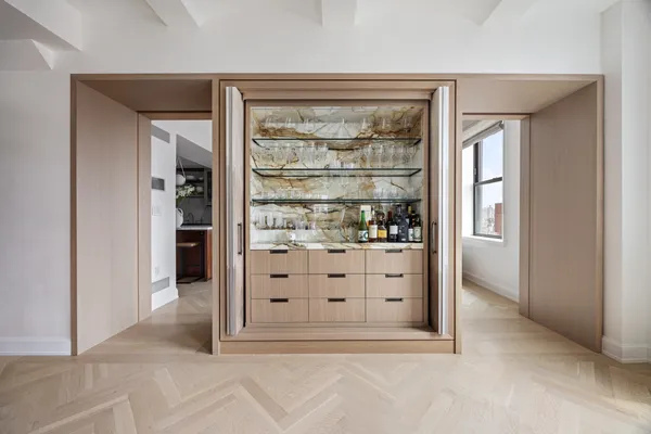 a large kitchen with stainless steel appliances granite countertop a sink and a stove